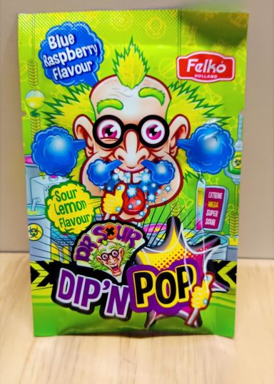 Dr Sour – Bonbon Ultra Acide Sachet Dr Sour Dip’N Pop avec design scientifique vert fluo et personnage cartoon, bonbon ultra acide.